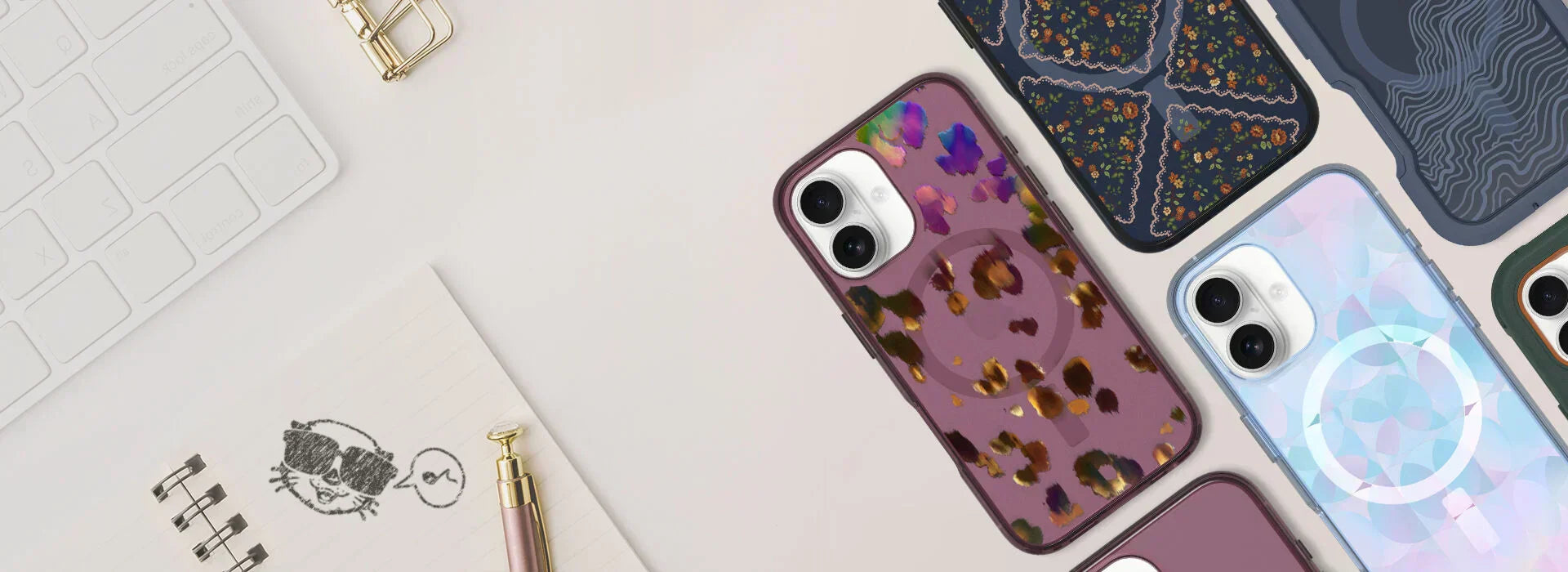 Colorful, protective, trendy OtterBox iPhone 17 phone cases on a desk with a sketch of an otter