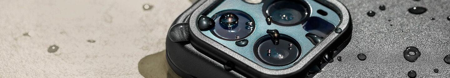 Black OtterBox Fre Series waterproof iPhone case with water drops on it