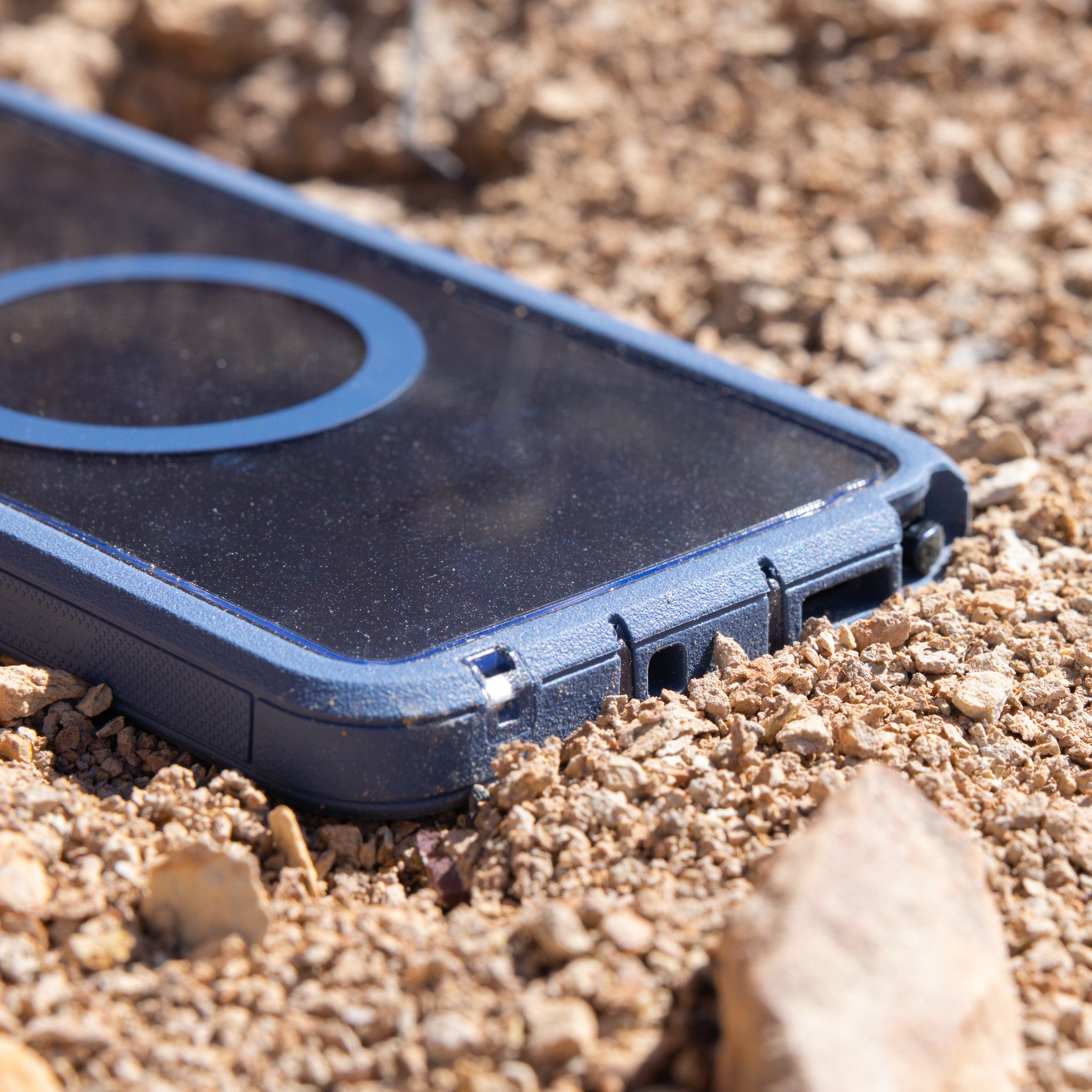 Defender XT phone case on a sandy surface