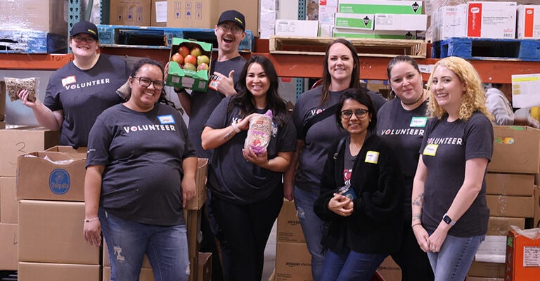 Otter employees volunteering at local food bank