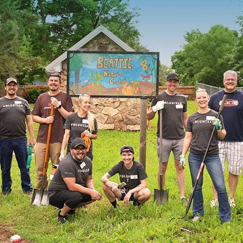 OtterBox employees posing outside nature center